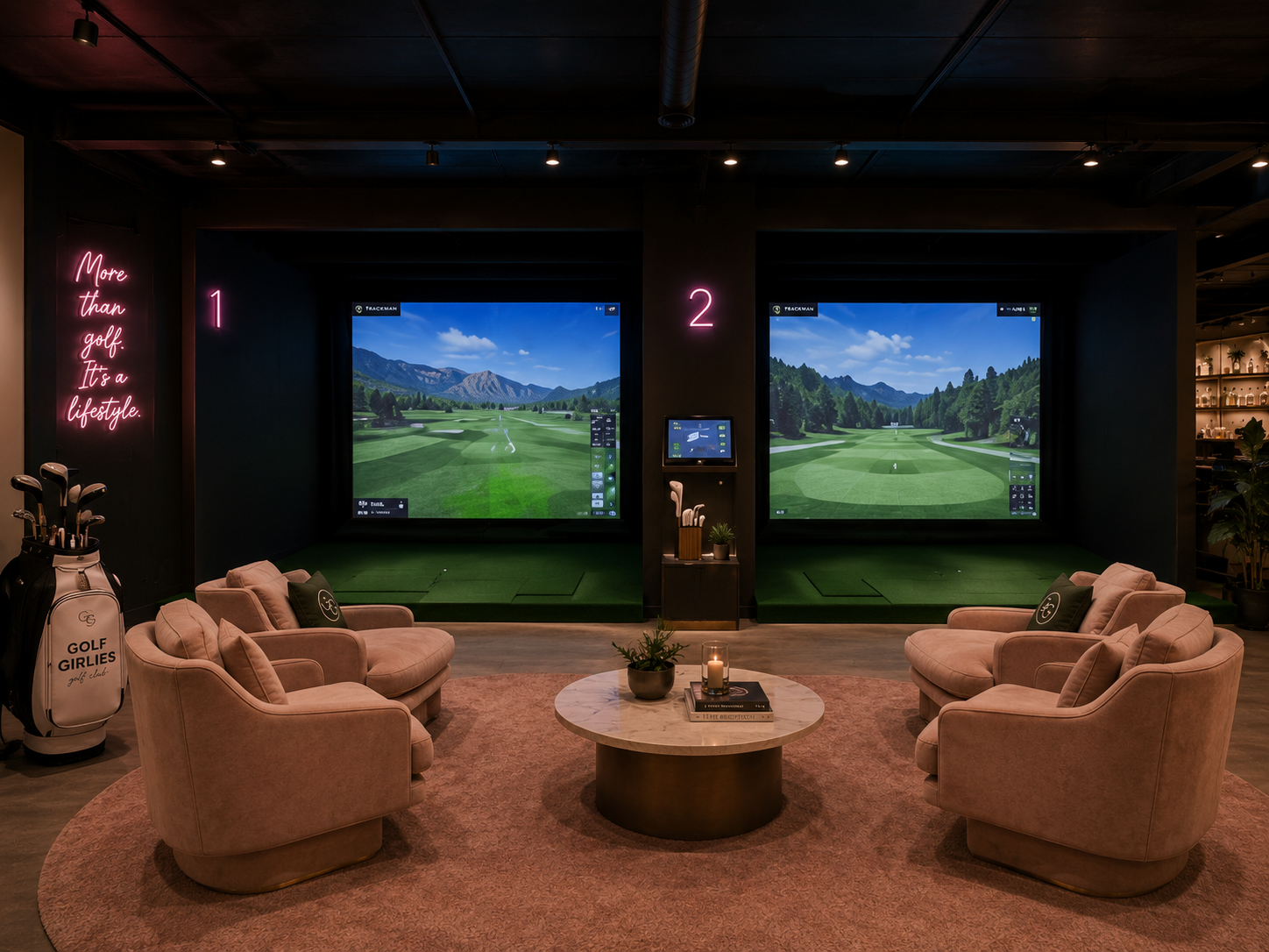 Two indoor golf simulator bays with lounge seating at Golf Girlies Golf Club